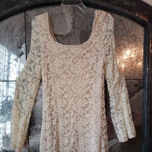 Cream lace dress with flaired long sleeve
